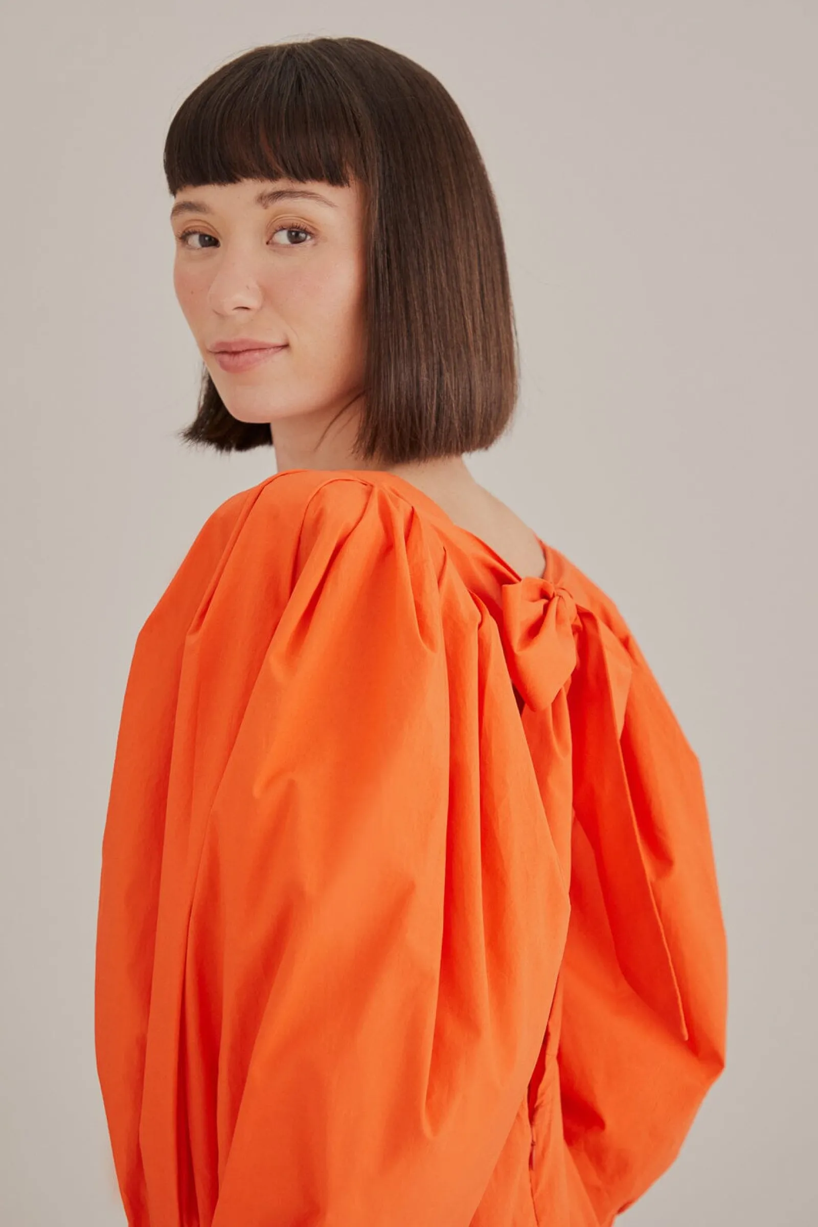 ORANGE OPEN BACK MINI DRESS