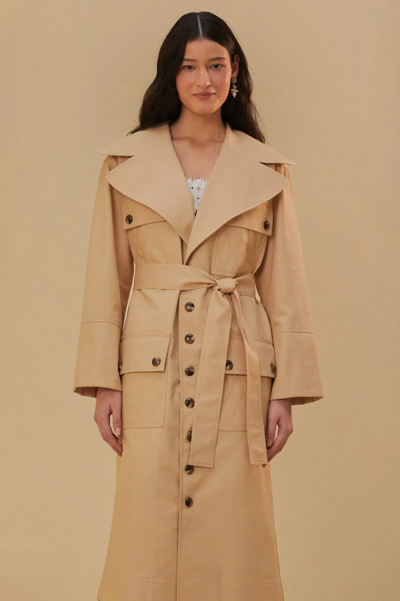 POCKETS OVER NUDE TRENCH COAT